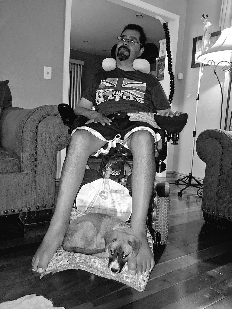 nova_nate38's tweet photo. LITERALLY THE CUTEST THING EVER! The puppy just got on my dads wheel chair and laid with him http://t.co/KhFrXK0gRo