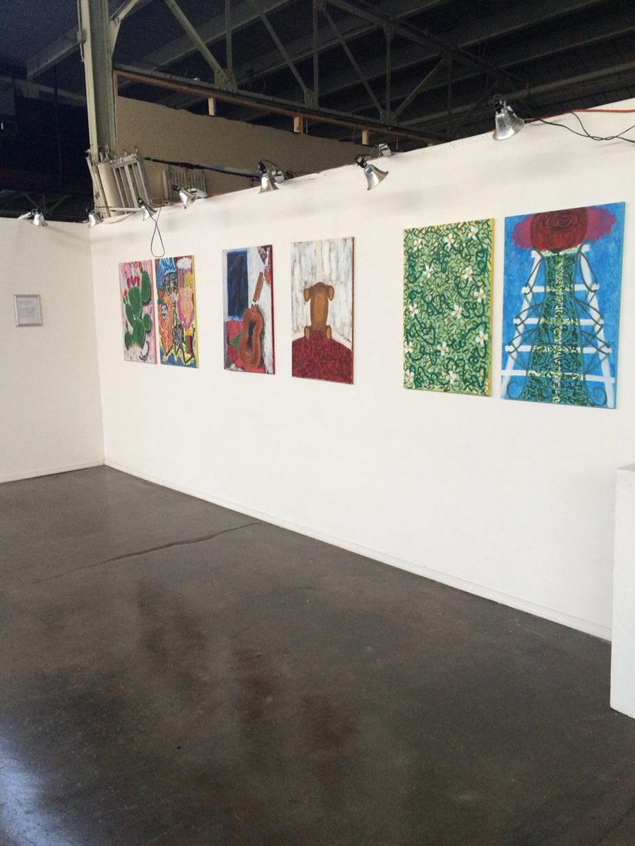 50 pieces of art by various artists, during runway show at American steel studio