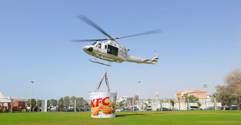 Emirates247's tweet photo. #KFC delivers to #Dubai beach by helicopter... http://t.co/e490raF5rZ http://t.co/YhRVvUQQdg