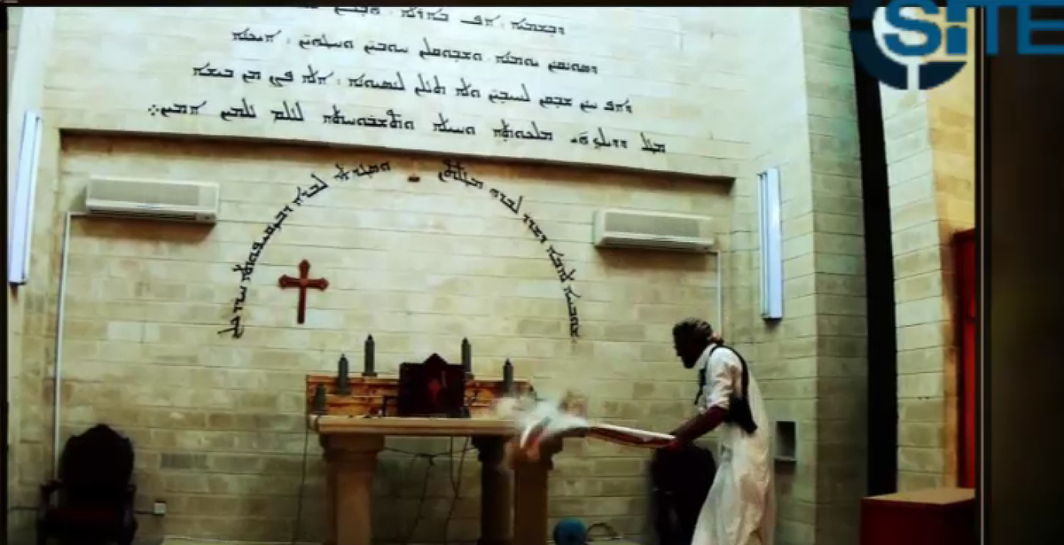 Rita_Katz's tweet photo. #ISIS vid claims "safety"for Christians in Syria yet shows killing of dozens Ethiopian Christians &amp; destroys churches http://t.co/oyrtFv0p8K