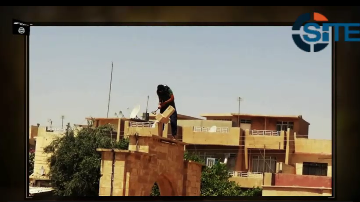 Rita_Katz's tweet photo. #ISIS vid claims "safety"for Christians in Syria yet shows killing of dozens Ethiopian Christians &amp; destroys churches http://t.co/oyrtFv0p8K
