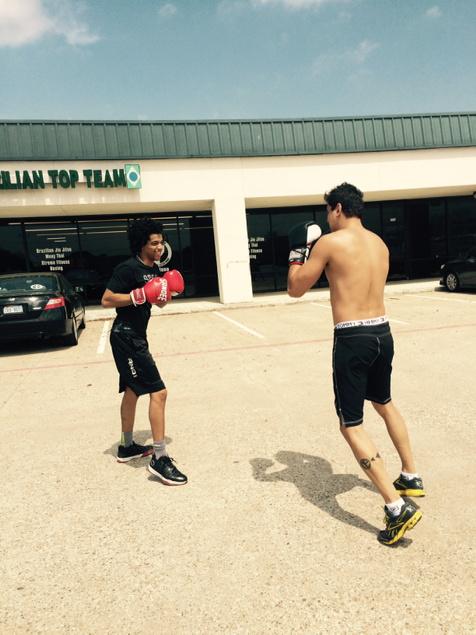 KaleSims's tweet photo. Prof and James getting some work in today! #simsmuaythai @BTT_Plano #btt4life #13 #muaythai #fightlife #bestteam #win http://t.co/Sdim7De9G4