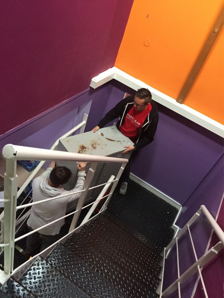 Bfs_Bac's tweet photo. Check Rob and Chris trying to get these drawers down the steps! We've been hard at work helping @BarnabusMcr #BAC15 http://t.co/jjsLRisgXw
