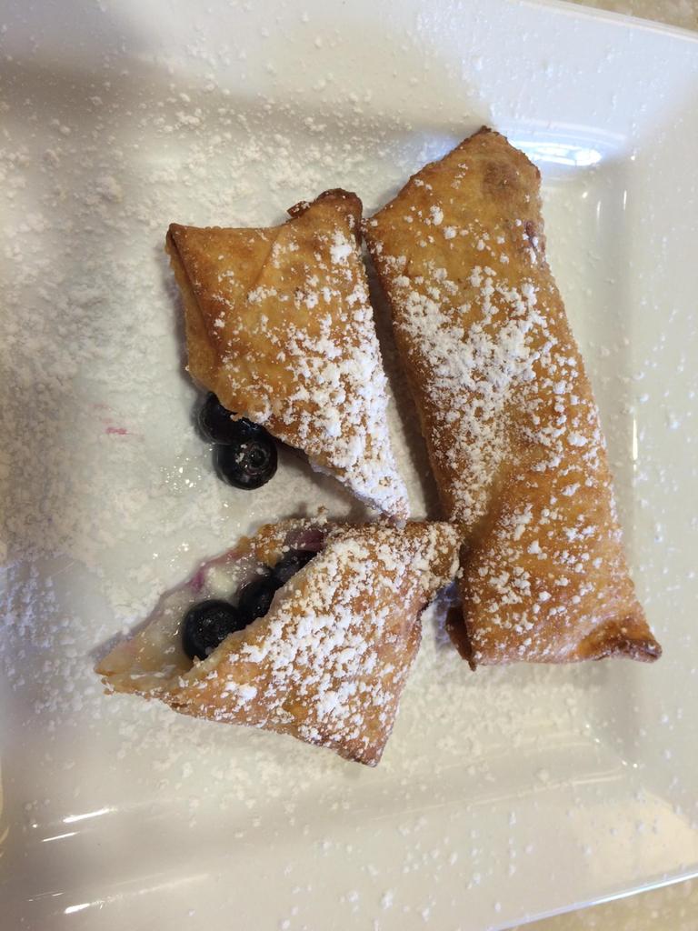Check out our dessert of the week - Blueberry Cheesecake Eggrolls! Bring a friend there's enough to share!