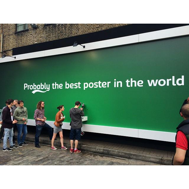 cleenerUK's tweet photo. Billboard in Shoreditch today dispenses FREE beer http://t.co/DASFlnFFL1 http://t.co/ekIan5cXS2