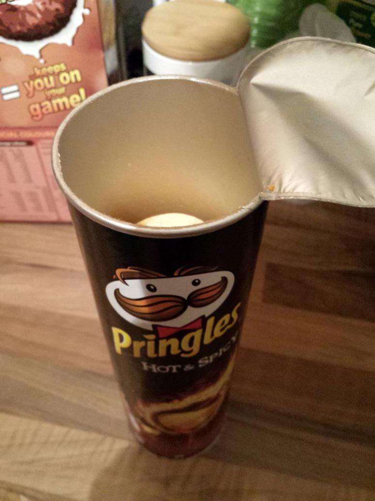 MehGoogleIt's tweet photo. @Pringles seems someone at the factory was a bit peckish before they sealed these. http://t.co/t54KO0f9SE