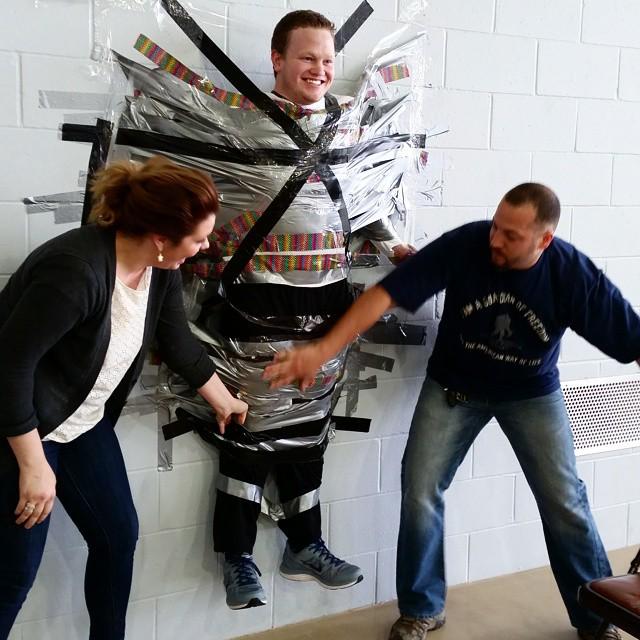 FairmontState's tweet photo. @fsupierpontsg Mitch taped to the wall in the Falcon Center Gym 1. @delta_zetafsu #Fairmon… https://t.co/thgDg8cWKT http://t.co/cxUNNIKoiS