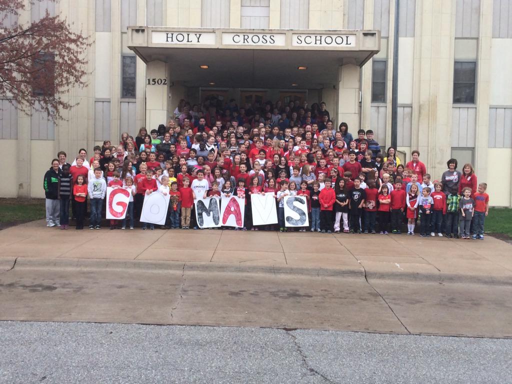 OmahaSnyder's tweet photo. Holy Cross school said wear Mav gear instead of uniforms to support hockey team! Pretty cool! #unomaha #FrozenFour http://t.co/CPLr0EG198