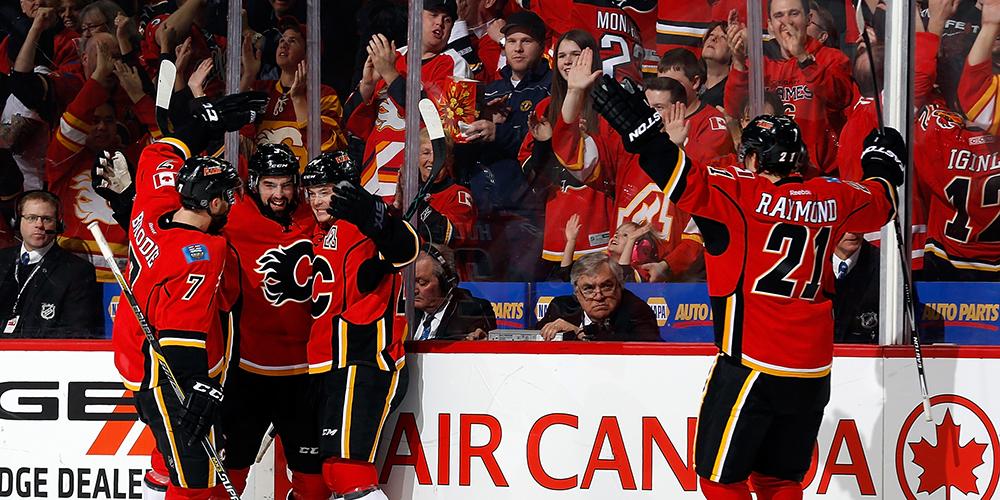 YOU CAN PUT IT IN THE WIN COLUMN! THE #FLAMES CLINCH A PLAYOFF SPOT WITH A 3-1 WIN OVER THE <a href="/LAKings/">LA Kings</a>! #NeverQuit