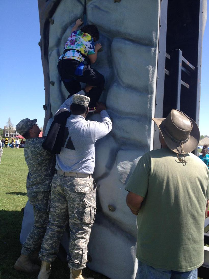 d_gattis's tweet photo. Jocilyn climbing a rock wall at the Special Olympics #withalittlehelpfrommyfriends #armystrong http://t.co/CkUKm2B32t