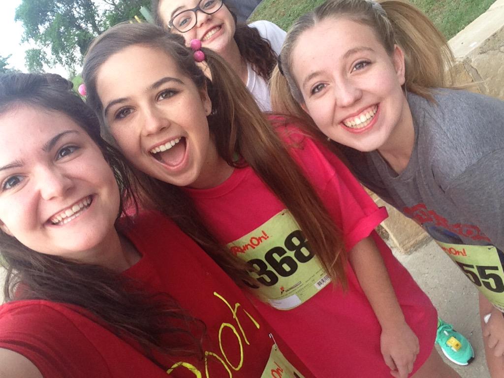 Katie_Primrose's tweet photo. We saw our faces on a poster or two and quite frankly things just went downhill from there #NextGen5K http://t.co/akec0b9o24