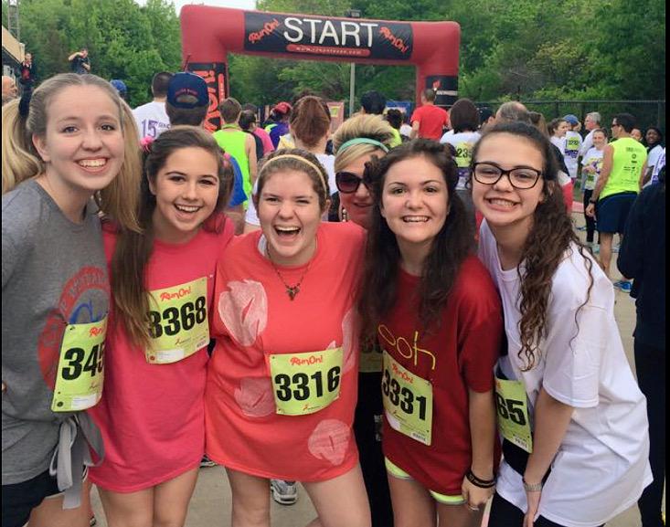 Katie_Primrose's tweet photo. We saw our faces on a poster or two and quite frankly things just went downhill from there #NextGen5K http://t.co/akec0b9o24
