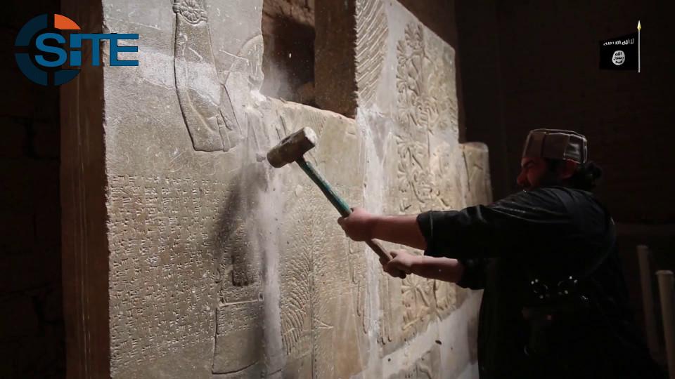 siteintelgroup's tweet photo. #ISIS released a video of fighters smashing and blowing up archaeological sites in the ancient city of Nimrud. http://t.co/TOPBbKgMT5