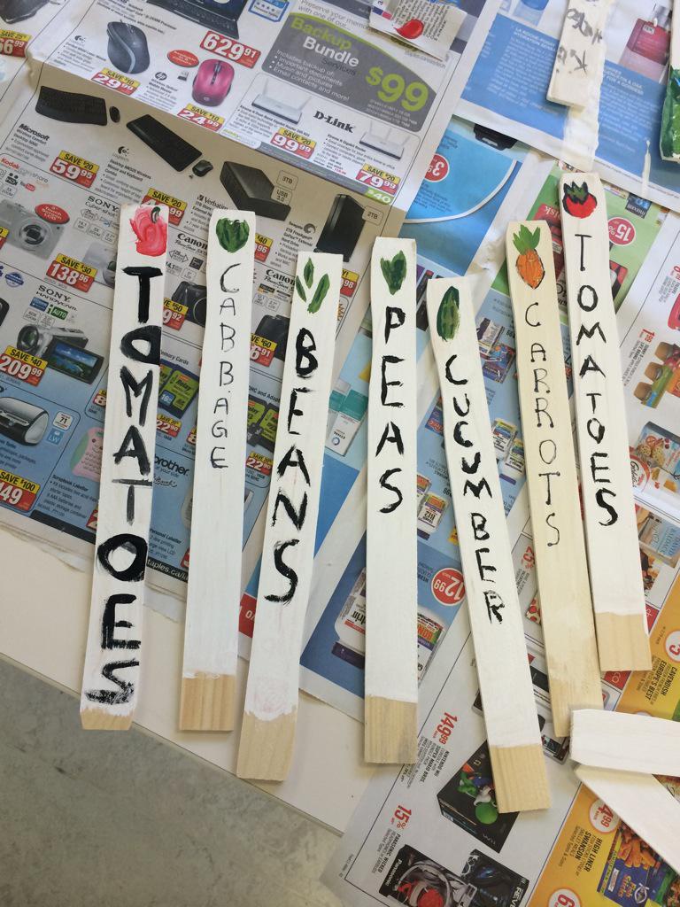 ConnaughtGarden's tweet photo. The kids making some markers for the garden http://t.co/R557aQm0Vd