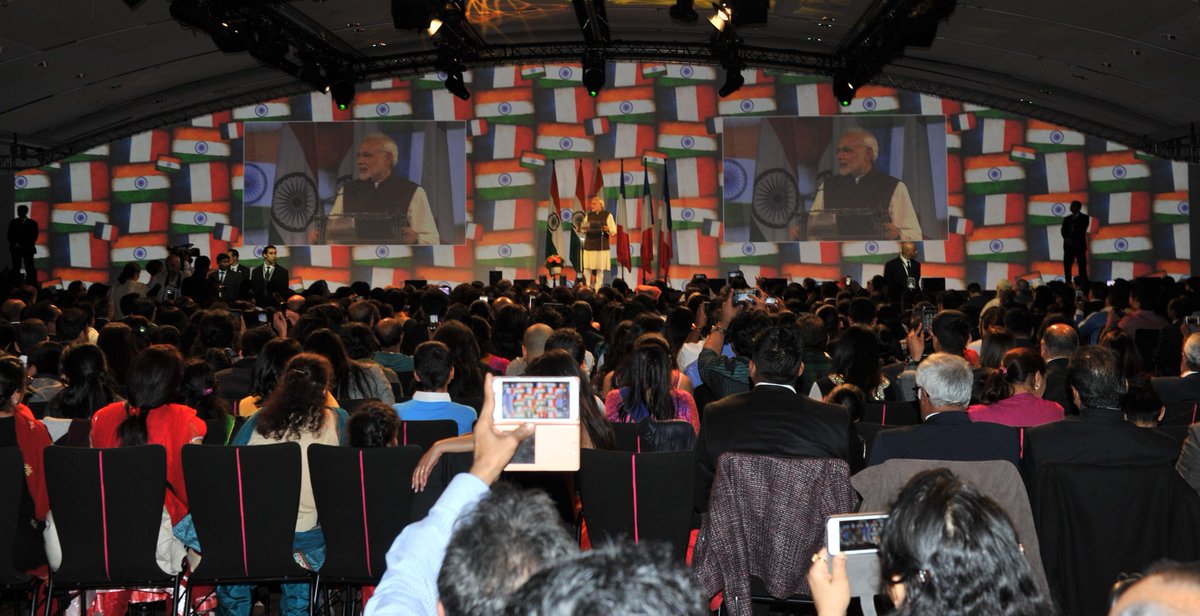 narendramodi's tweet photo. Deeply touched by the affection at the civic reception in Paris. Sharing my speech. http://t.co/JZq0AnS290 http://t.co/4rTFXgd4tZ