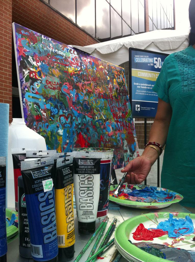 TCCollege's tweet photo. Our community canvas is coming along! Be sure to stop by and contribute @mainstreetarts #TCCMainSt #MainSt2015 http://t.co/xosmAsCugH