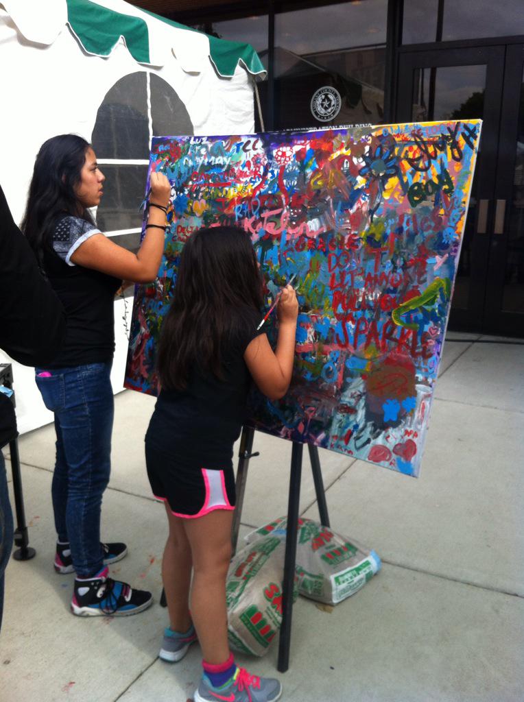 TCCollege's tweet photo. Our community canvas is coming along! Be sure to stop by and contribute @mainstreetarts #TCCMainSt #MainSt2015 http://t.co/xosmAsCugH