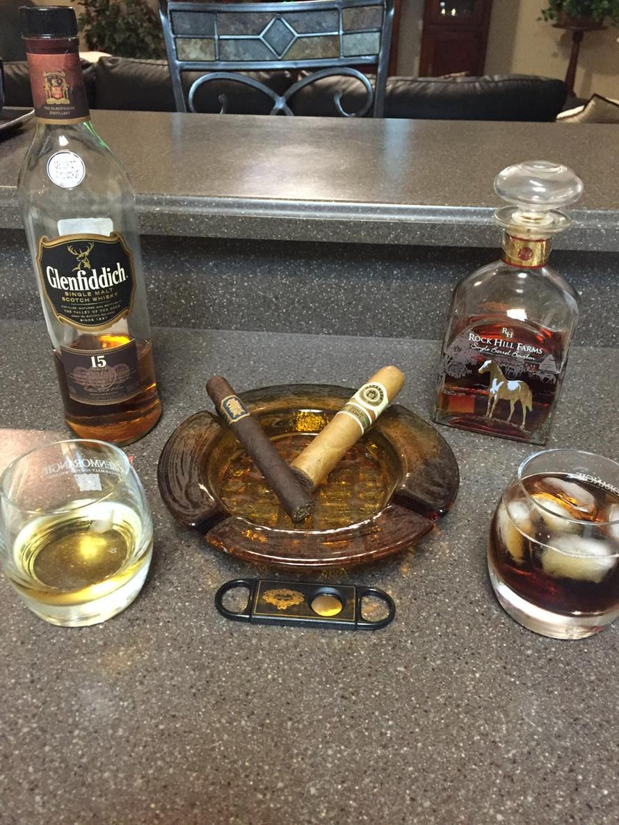 ABCWineKenA's tweet photo. After a long day of baseball, time to chill with a Drew Estate Undercrown, Macanudo Gold Label and a few cocktails. http://t.co/BDeXKoNjBn