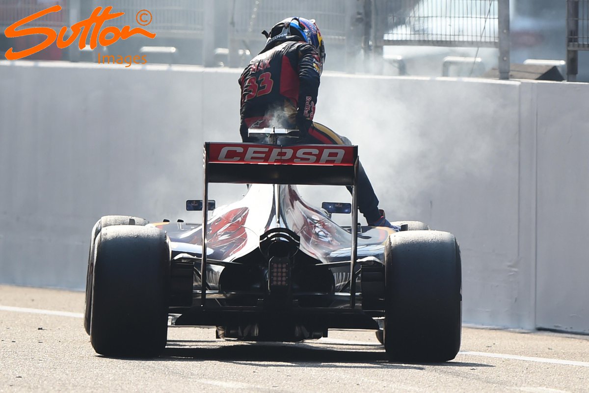 MSI_Images's tweet photo. Drama - @MaxVerstappen3 climbs out of his smoking @ToroRossoSpy on the pit straight #ChineseGP #F1 http://t.co/UdRwbQTNKa