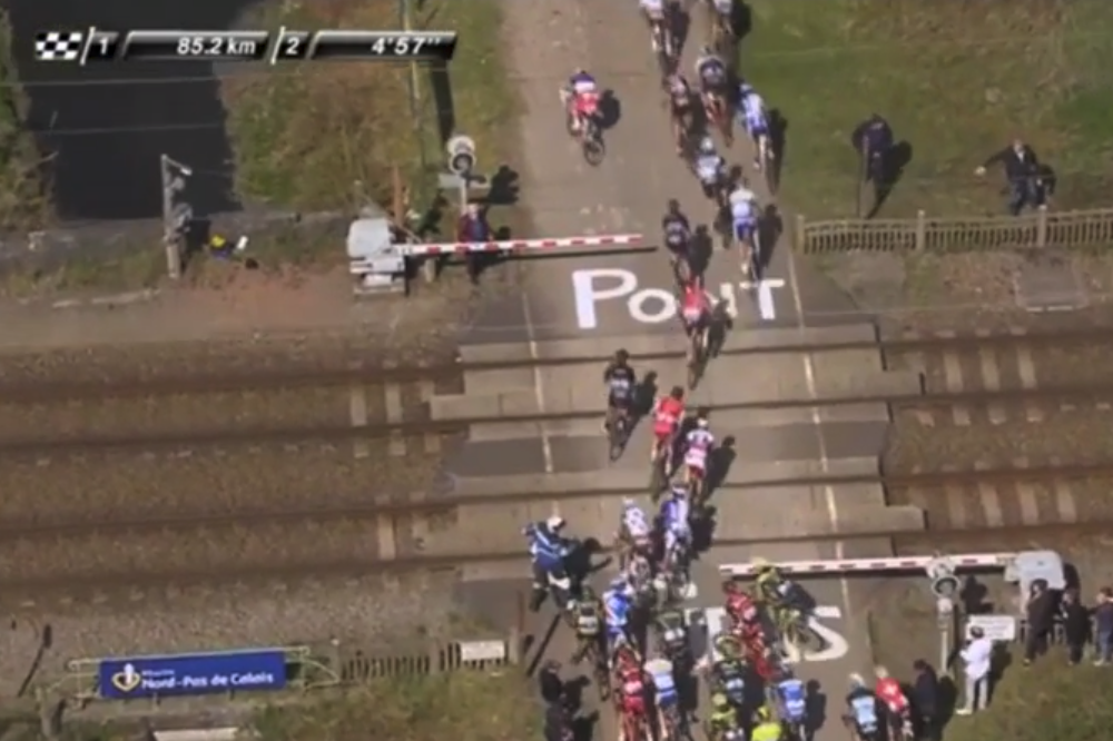 cyclingweekly's tweet photo. Riders take risk over level crossing during Paris-Roubaix (video) | http://t.co/czJTNhNEC3 http://t.co/wACV4nQfDb