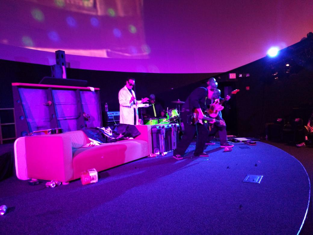 AstroPopDC's tweet photo. From last night: The @AtomicMosquitos and Professor Watson Herbusch. #C2YN #YurisNight http://t.co/Qlyw4Jv73S