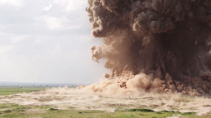 RT_America's tweet photo. Appalling #ISIS video shows ancient Assyrian city of Nimrud being razed to ground http://t.co/xn72D3UFzc http://t.co/j1VIvJRDNu