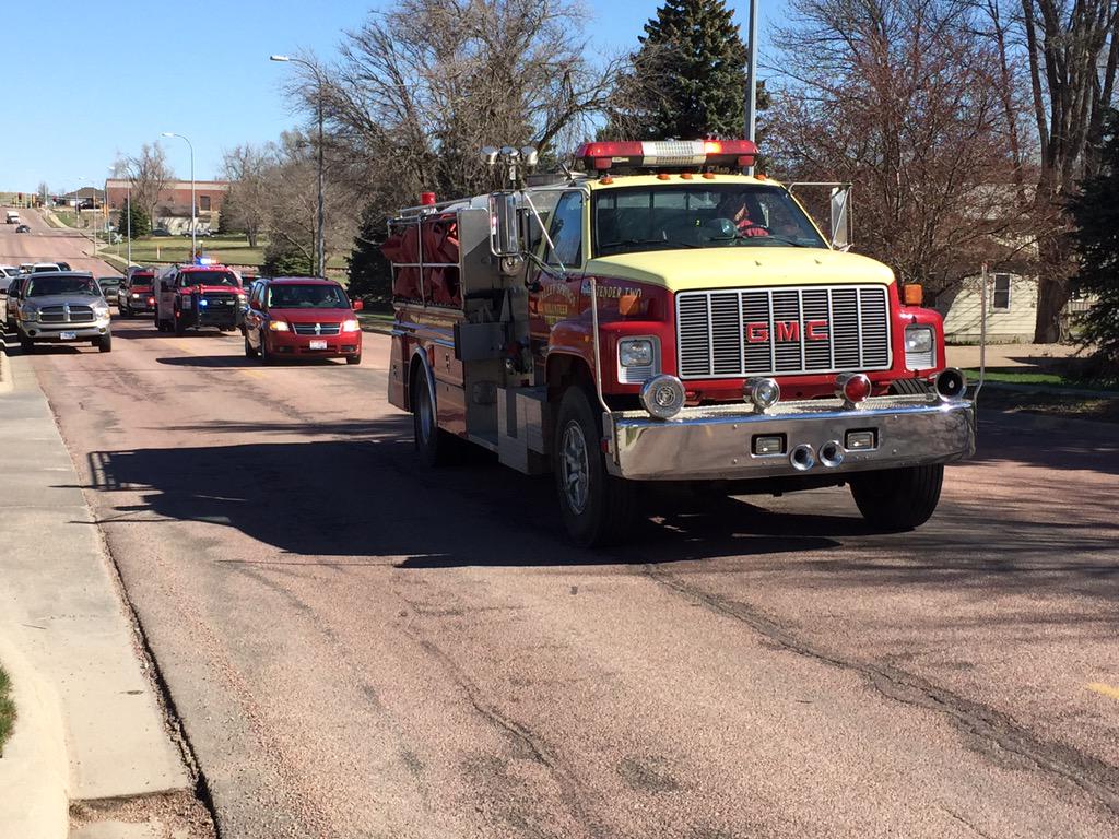 JaKobe56's tweet image. @ksfynews a processional of fire engines and emergency vehicles leave the site of last night's fatal fire in Brandon