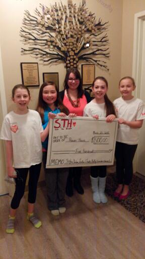 Amazing student leaders donating $500 to Rowan's House.  All of their of fundraising initiative!!