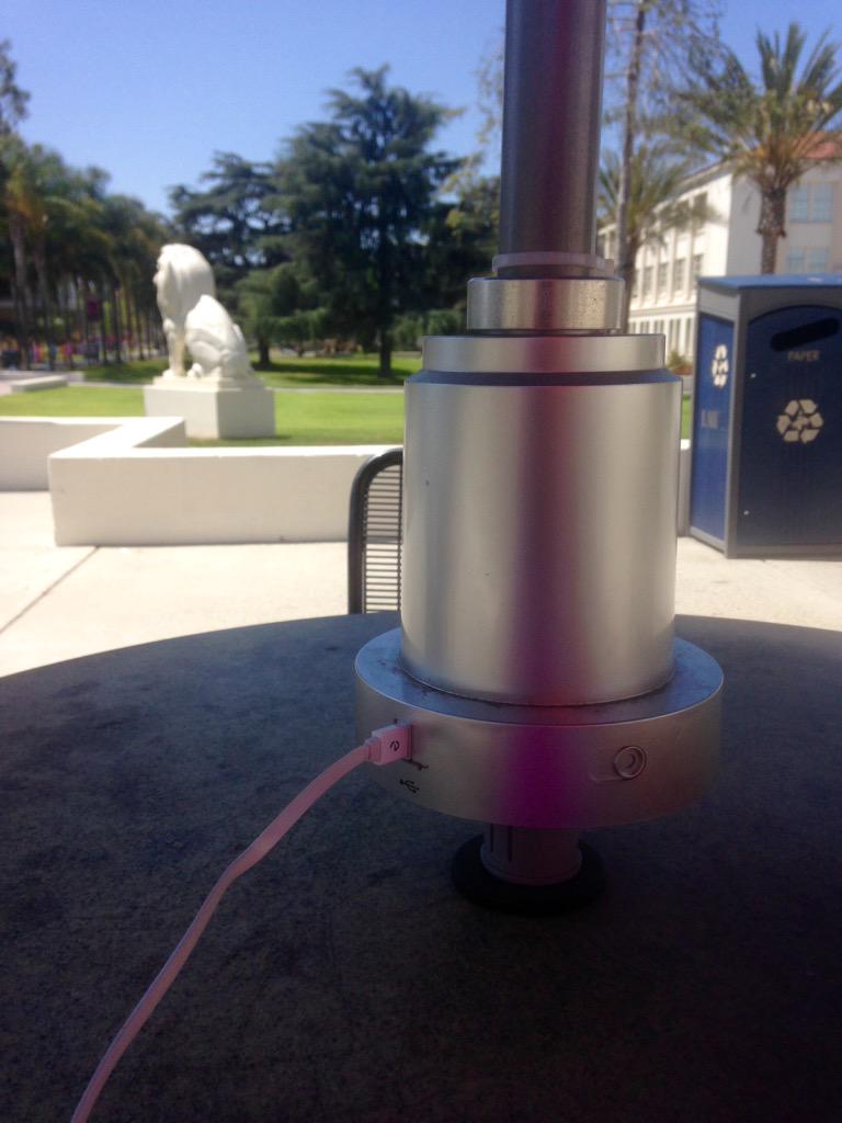 annamelissa's tweet photo. You know you go to a bougie school when you have shit like solar powered umbrellas that charge phones. π #LMUProblems http://t.co/e3WvqVrmMo
