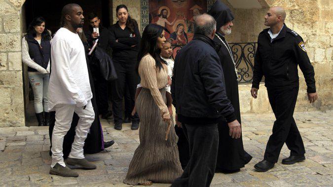 THR's tweet photo. Kim Kardashian, Kanye West Get Daughter Baptized in Jerusalem http://t.co/57qdqRPpi0 http://t.co/BqmLQzIsIW