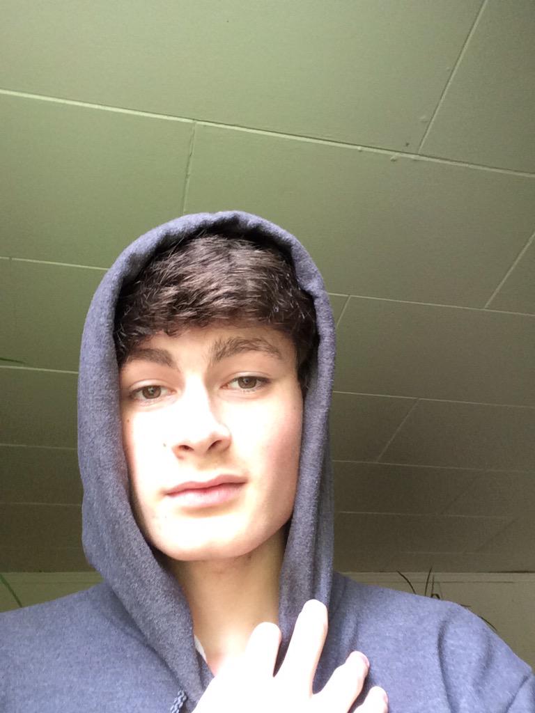brown hair boy selfie