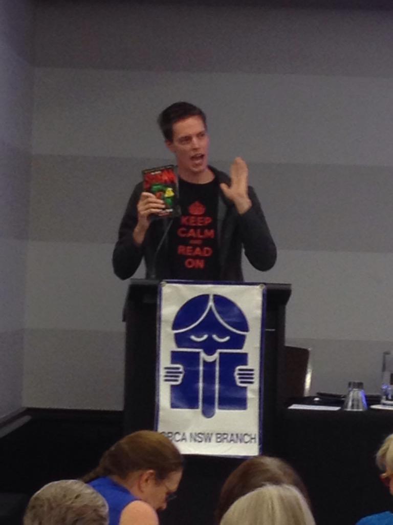 CBCANSW's tweet photo. #CBCA2015 Jack Heath spruiking for his books &amp; Scholastic http://t.co/J2WUssCtlj