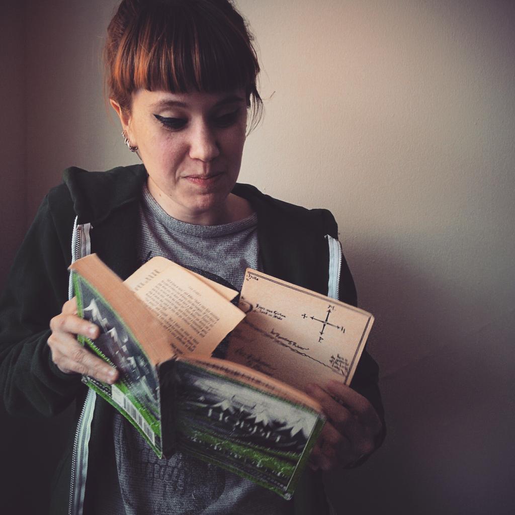 UofTSCCO's tweet photo. Anna Standish, Collection &amp; Public Services Student Assistant @ischool_infosrv , shares her favorite book #UTLReads http://t.co/CXfdTCqqrA