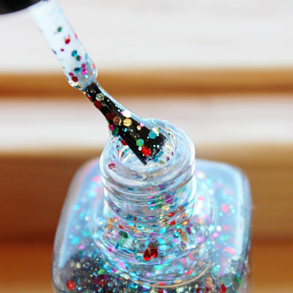 Magical Night, a clear-base filled with colorful confetti shape glitter. Now on Winstonia.com #nailpolish