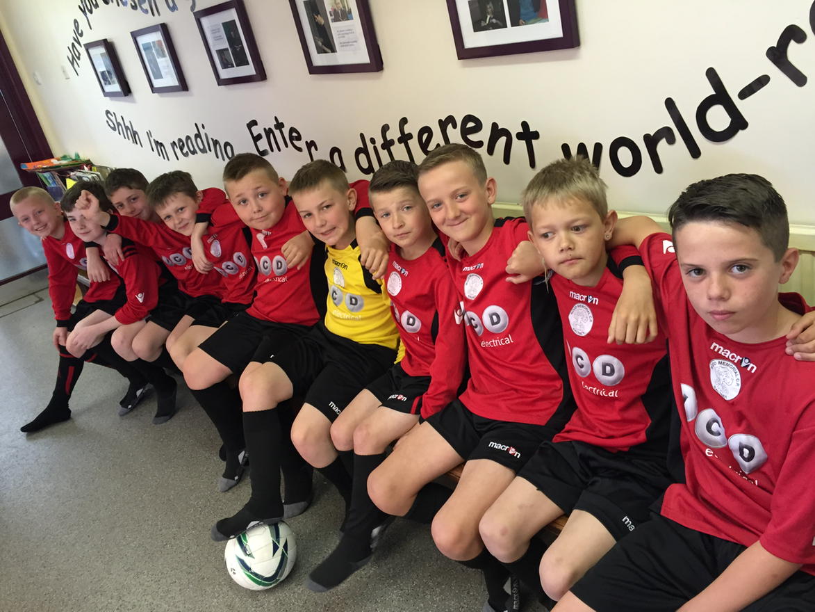 The boys getting ready for their team photo. Looking smart!