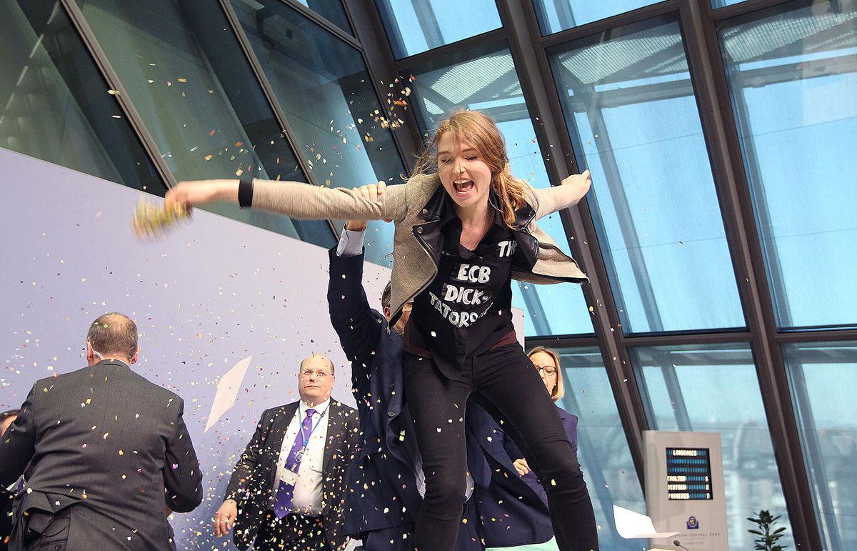 business's tweet photo. Internet reacts to confetti-throwing protester who disrupted ECB press conference http://t.co/uBG2VQEhK4 http://t.co/HtHdTQ2S81