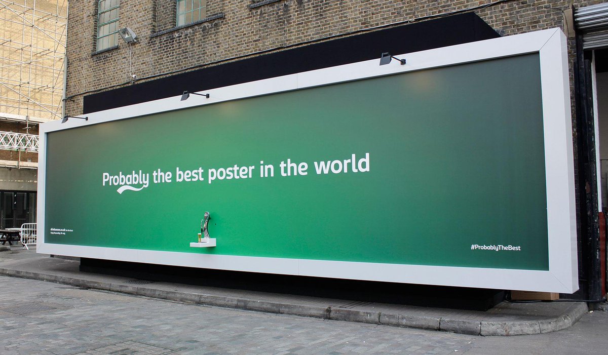 Carlsberg makes Londoners happy with a billboard that gives out free beer. adweek.it/1D1Zstq