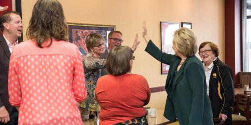 HillaryClinton's tweet photo. High fives in Marshalltown, Iowa. http://t.co/x2K9sU1UVo
