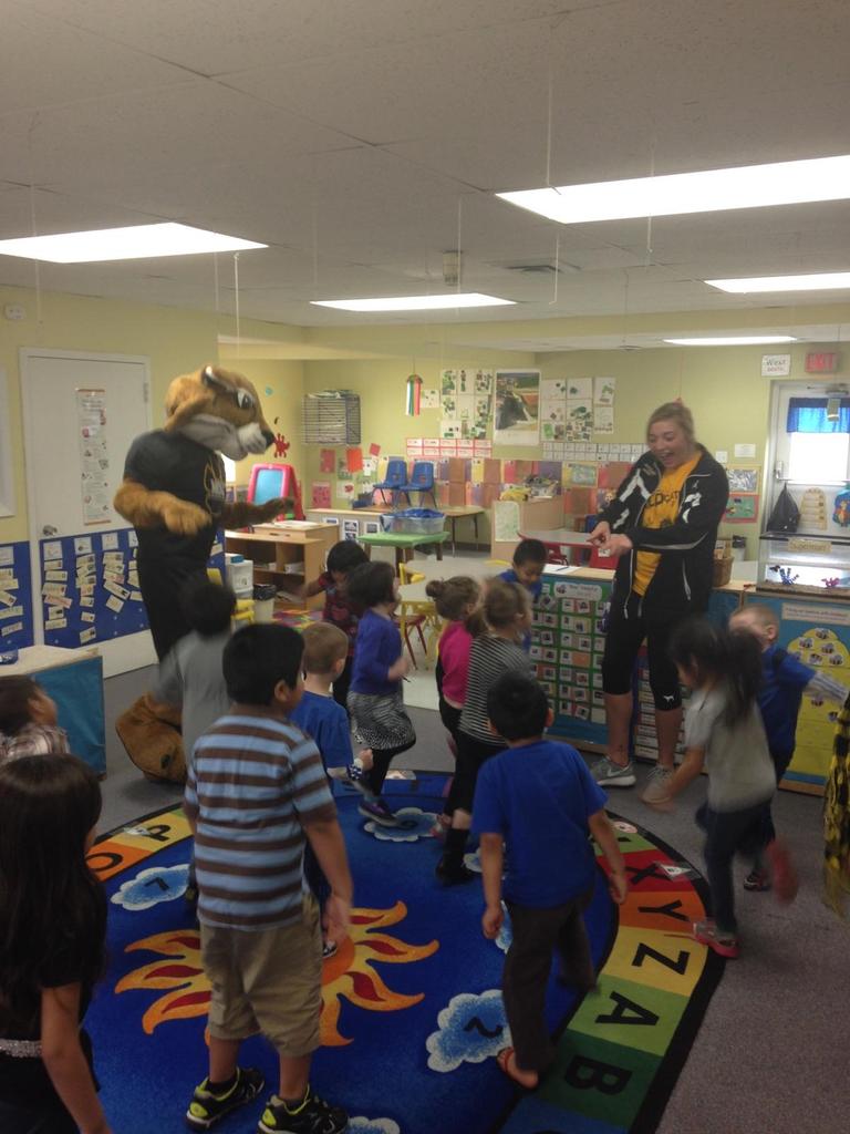 Paige, Willy, and Coach K. having some fun with the Head Start students today!
