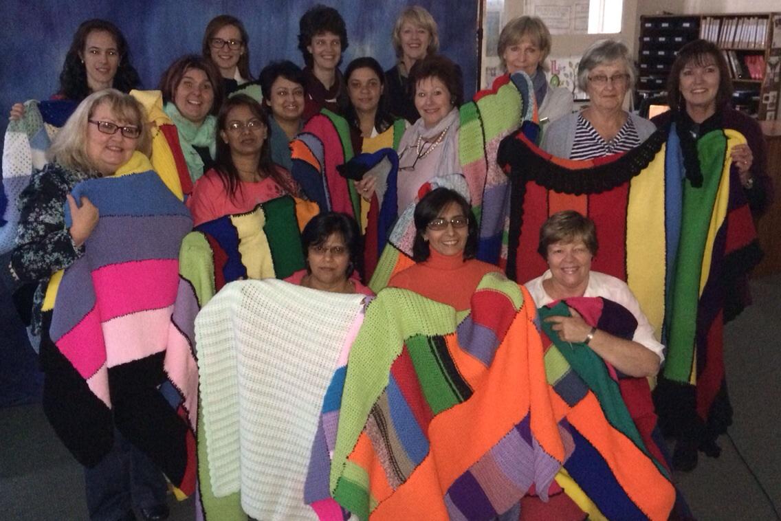 JenniGarnett's tweet photo. @Russell_High staff wrapped themselves in the blankets they dropped off for @67Blankets yesterday! http://t.co/zU5y4IWwPJ
