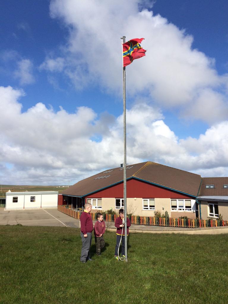 stanprimary's tweet photo. St Magnus day celebrations get under way at St Andrews with the raising of the Orkney flag, thanks to p3L. http://t.co/rnluM2mbw6