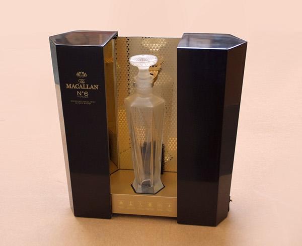.<a href="/The_Macallan/">The Macallan</a> N.6 in Lalique enclosed in a sleek case made of Corian®. Redesign executed by Zone Creations.