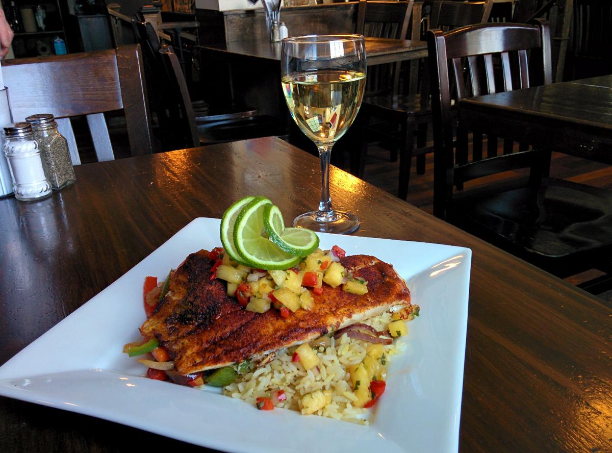 Blackened tilapia with  pineapple salsa and pilaf rice. GO HABS GO!!!!