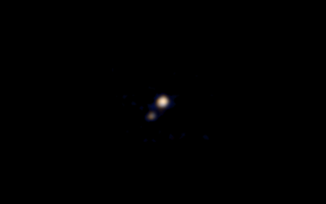 ForbesTech's tweet photo. This is the first color photo of Pluto: http://t.co/2ZbvMiBqGP http://t.co/F5SniV8hXP