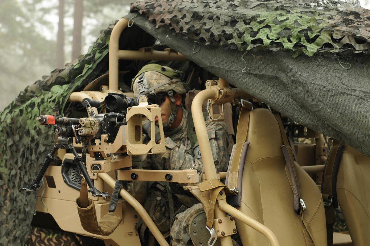 USArmy's tweet photo. A @82ndABNDIV paratrooper provides security from a LTAT vehicle during #CJOAX1501 on Fort Bragg, NC, Apr 14, 2015 http://t.co/ifnHjEsXiQ