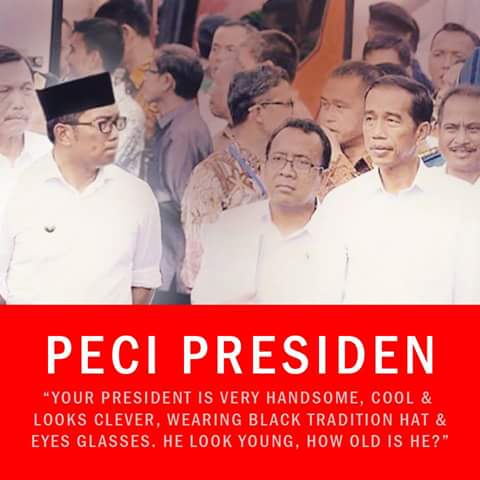 aridwansopari's tweet photo. #PresidenYangTertukar Turis Jerman salah sangka Bukan Jokowi 'Presiden' Ridwan Kamil berpeci itu sudah identitas http://t.co/085BTS5kDt
