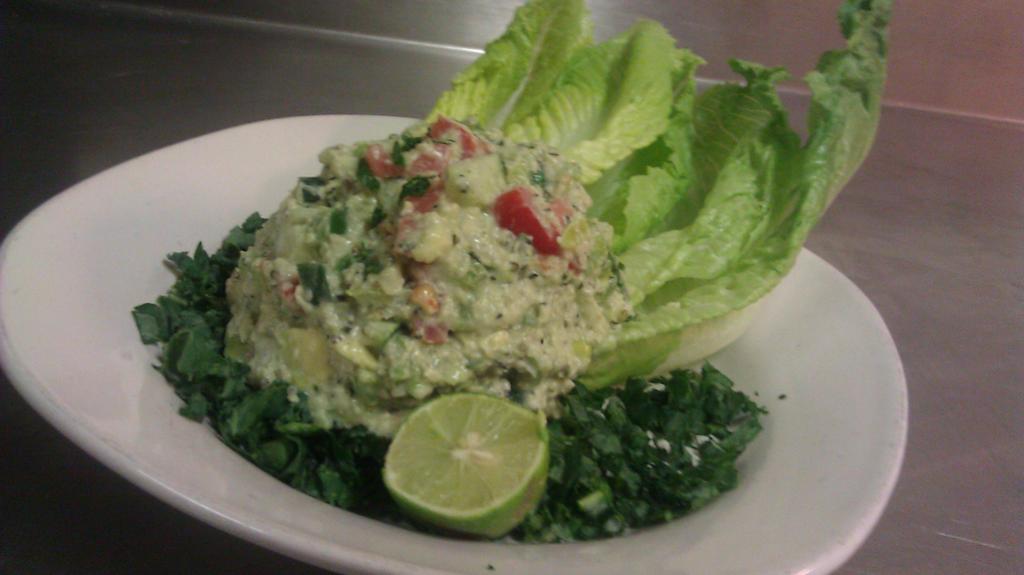 Hempseed Salad on a bed of limed Kale ”RAW VEGAN ALKALINE”