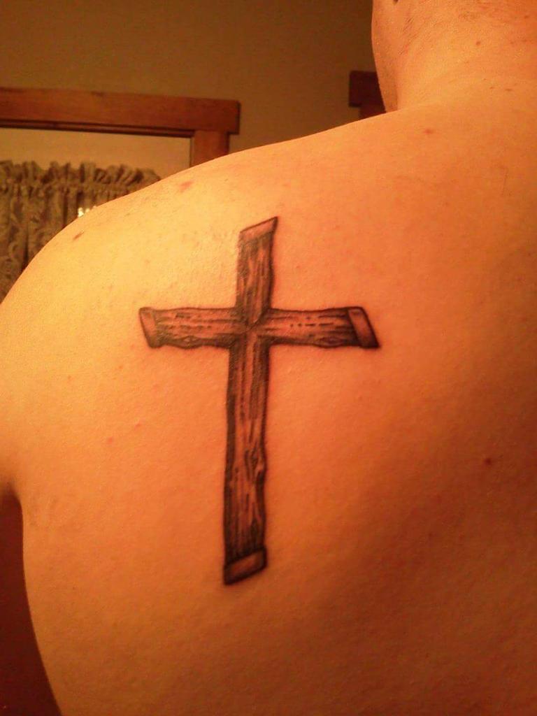 PostYourInk's tweet image. We see a lot of crosses but Nick C. From Massachusetts is one we haven't seen before, simple and detailed