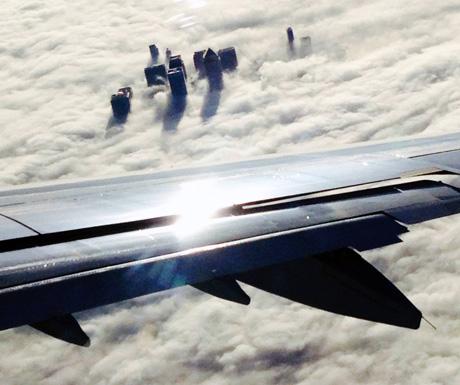 luxurytravel's tweet photo. Photograph of the week: Canary Wharf above the clouds http://t.co/NY5xnWwm8y http://t.co/14ToM5mA9X