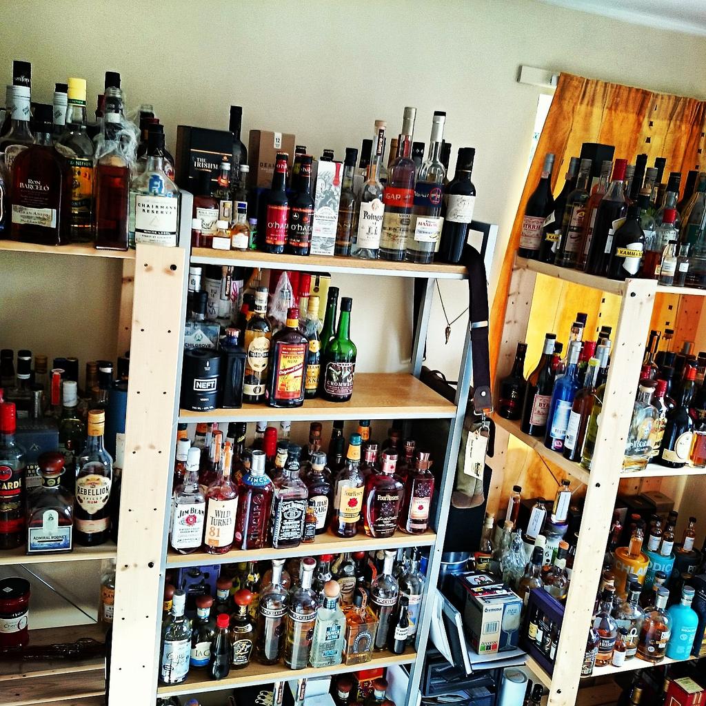 DrinksEnthusist's tweet photo. Think i need to open my bar quickly. Office shelves are getting full #drinksenthusiast #needabar http://t.co/qWLsx6I5JE